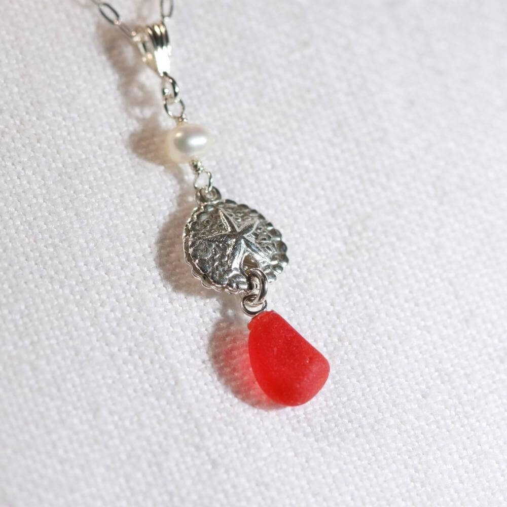 Rare Red Necklace with Sand dollar charm in Sterling Silver