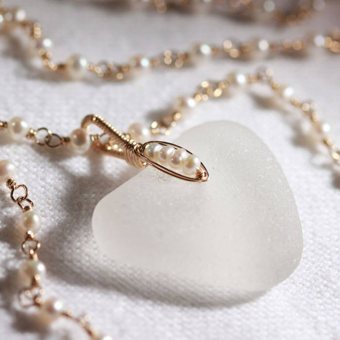 White heart sea glass pendant on a pearl and 14kt GF chain