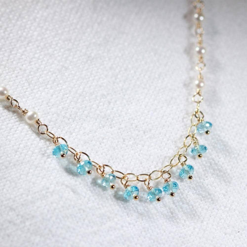 Swiss Blue Topaz and pearl charm necklace in 14 kt Gold-Filled
