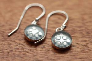 Tiny Shiny Shimmering snowflake earrings made from recycled Starbucks gift cards, sterling silver and resin