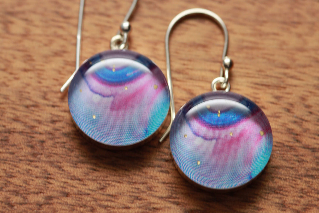 Swirly earrings made from recycled Starbucks gift cards, sterling silver and resin