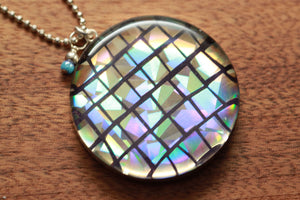 Sparkly Disco Ball necklace made from recycled Starbucks gift cards, sterling silver and resin
