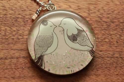 Love Bird necklace made from recycled Starbucks gift cards, sterling silver and resin