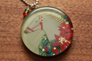 Holiday Horse necklace made from recycled Starbucks gift cards, sterling silver and resin