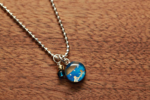 Tiny Ornament necklace made from recycled Starbucks gift cards, sterling silver and resin