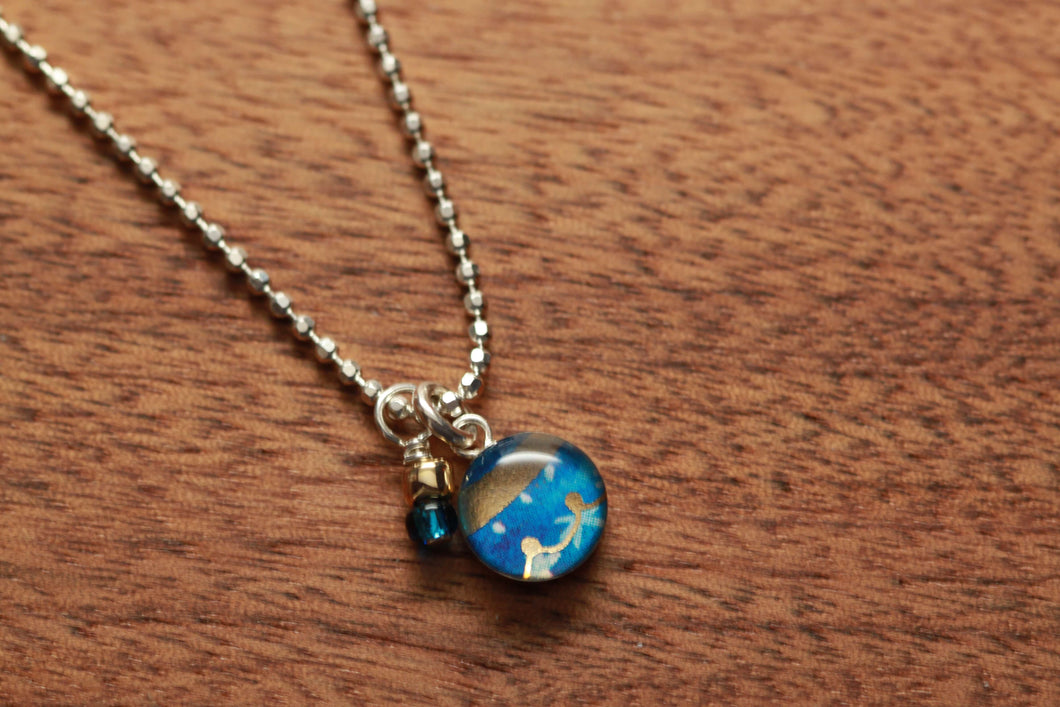 Tiny Ornament necklace made from recycled Starbucks gift cards, sterling silver and resin