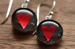 Red heart earrings made from recycled Starbucks gift cards, sterling silver and resin