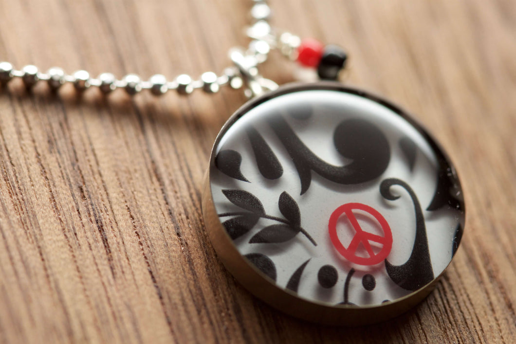Peace Sign Necklace made with recycled Starbucks gift cards, sterling silver and resin