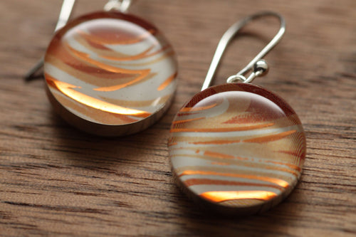 Latte swirl earrings made from recycled Starbucks gift cards, sterling silver and resin