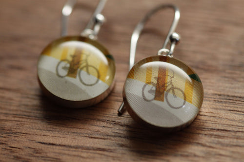 Bicycle earrings with sterling silver and redin. Made from recycled, upcycled gift cards