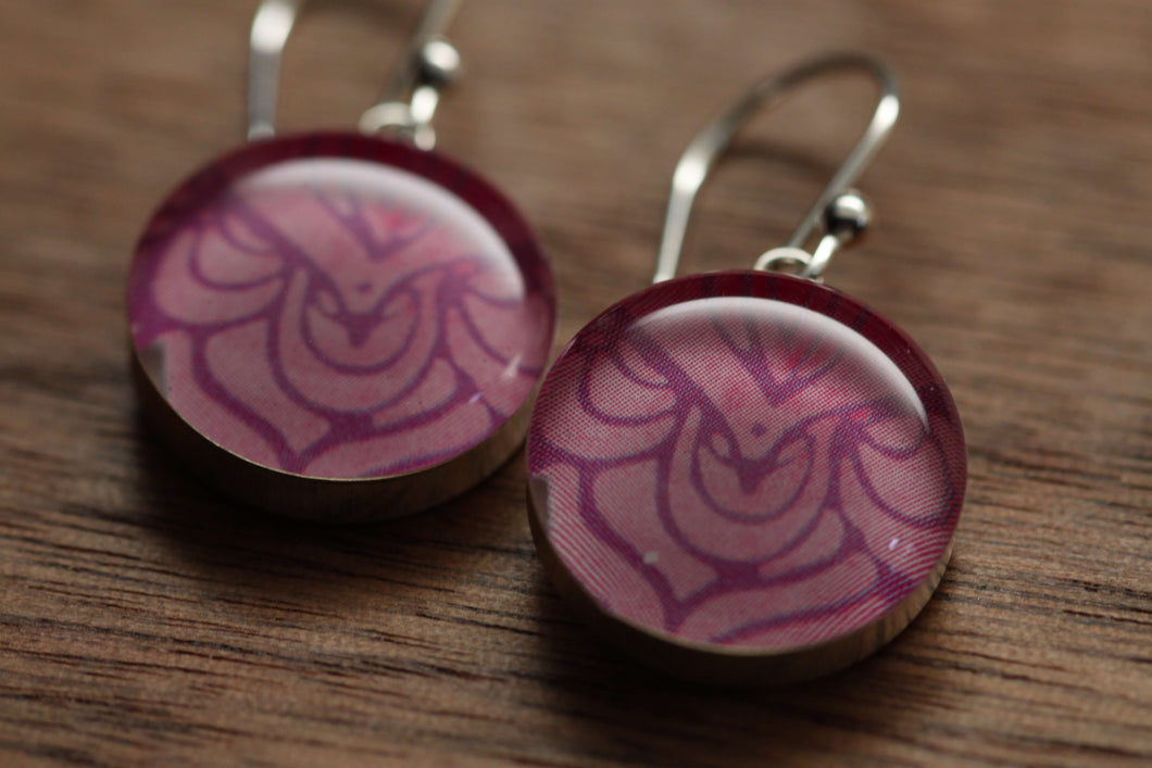 Fuchsia flower petal earrings made from recycled Starbucks gift cards. sterling silver and resin