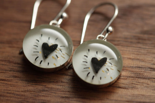 Black heart earrings made from recycled Starbucks gift cards. sterling silver and resin