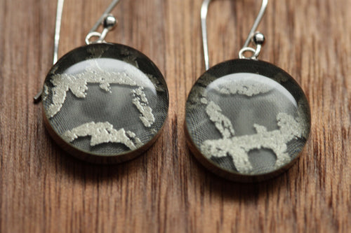 Silver abstract earrings made from recycled Starbucks gift cards, sterling silver and resin