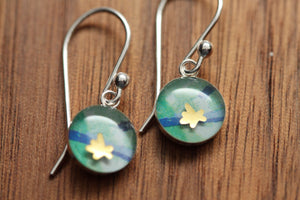 Tiny golden flower earrings made from recycled Starbucks gift cards, sterling silver and resin