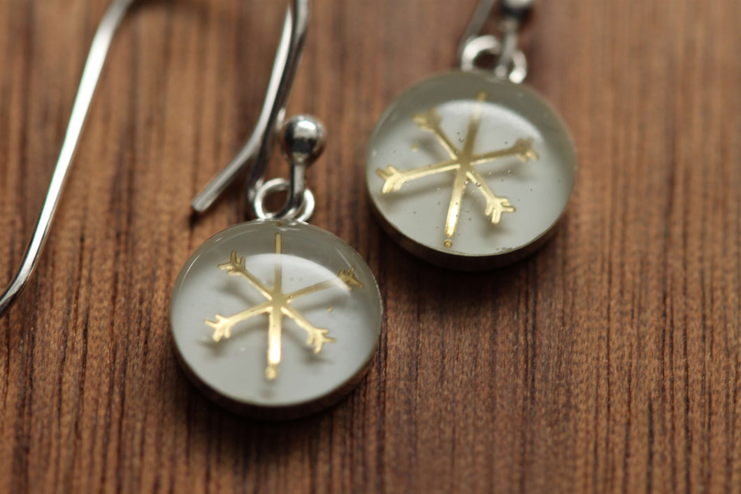 Tiny Golden snowflake earrings made from recycled Starbucks gift cards, sterling silver and resin
