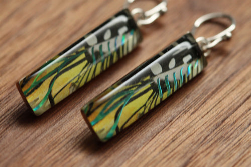 Yellow feather earrings made from recycled Starbucks gift cards, sterling silver and resin