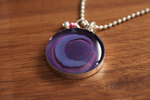 Purple Crescent moon necklace made from recycled Starbucks gift cards, sterling silver and resin