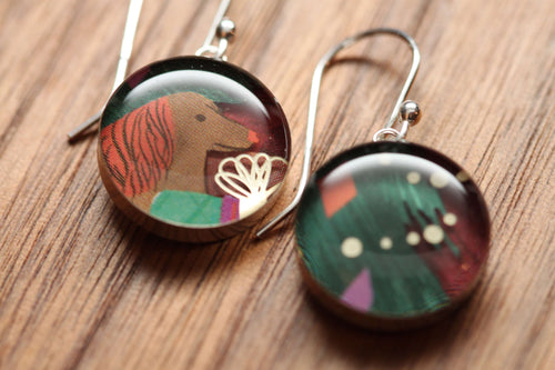 Christmas Dog under the tree earrings made from recycled Starbucks gift cards. sterling silver and resin